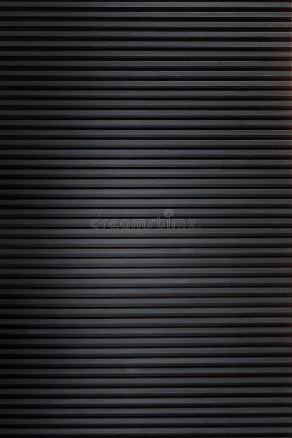 black solid wooden battens wall pattern background stock photo