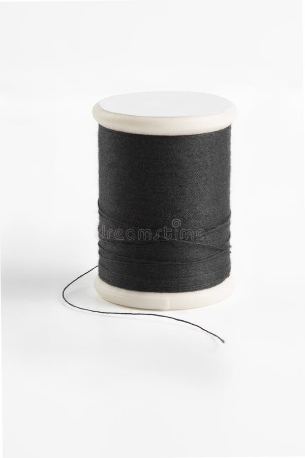 Black spool has shadow on white background. royalty free stock image