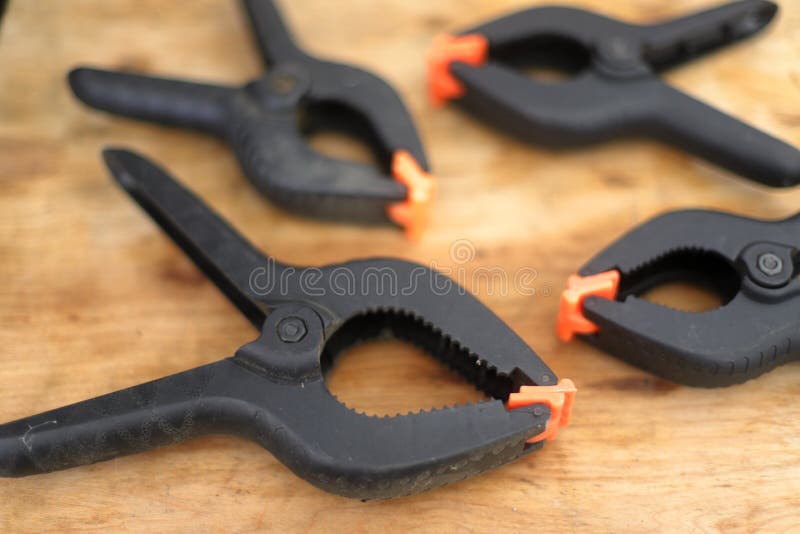 Black Spring clamps on workbench