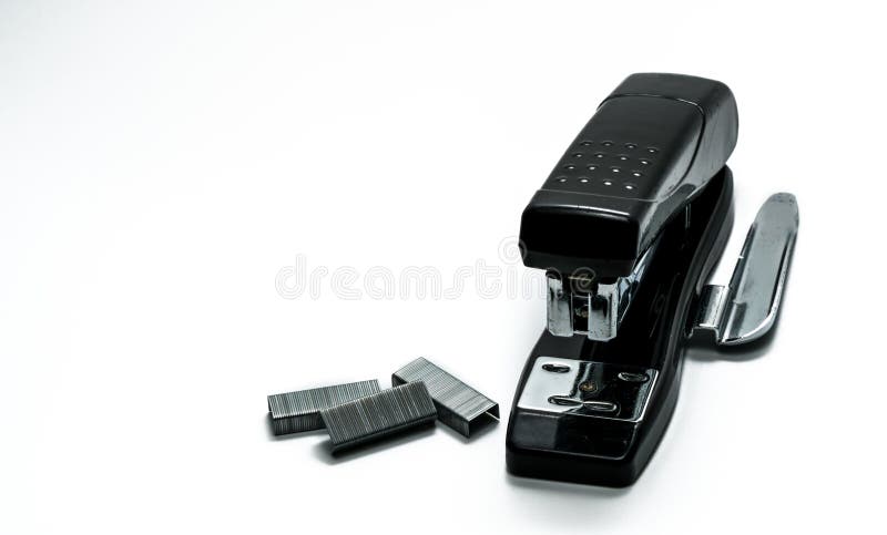 Black stapler and staples that have been used in the office for
