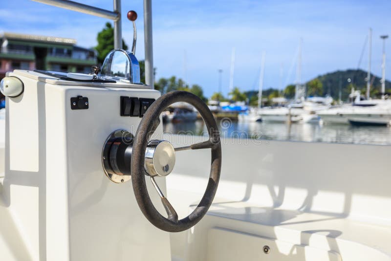 Black Steering Wheel on Speed Boat at Pier Stock Photo Image of sail