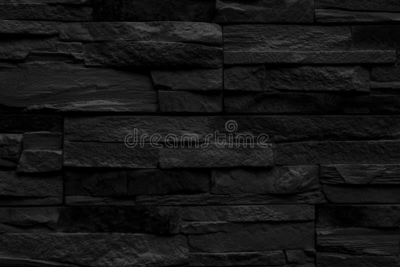 Black Stone Wall of a Building. Interior of a Modern Loft Stock Photo