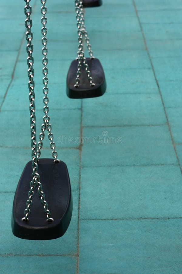 Black Suspension Swing on a Blue Background Stock Image Image of