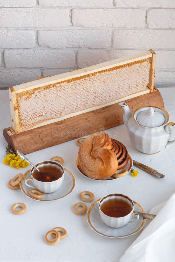 Cup Of Tea, Teapot And Honeycomb On A Plate, Withhoneycomb On