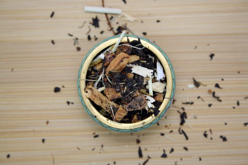 Black Tea Infused with Various Herbs. Space for Text Stock Photo