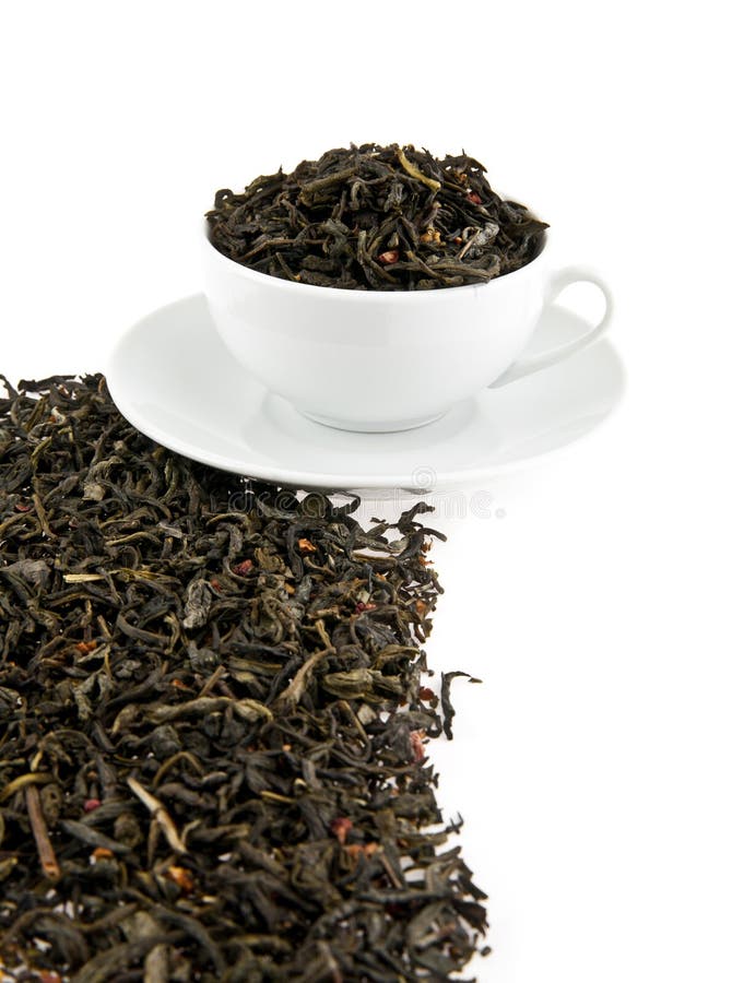 Black tea leaves in a cup stock image. Image of green 47079687