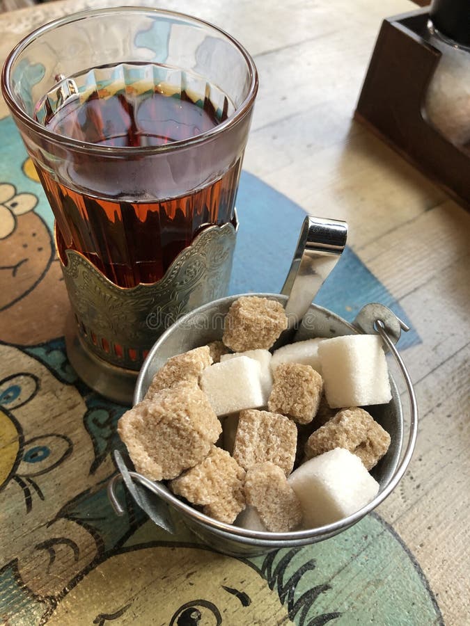 Black tea with sugar View stock image. Image of white 244002995