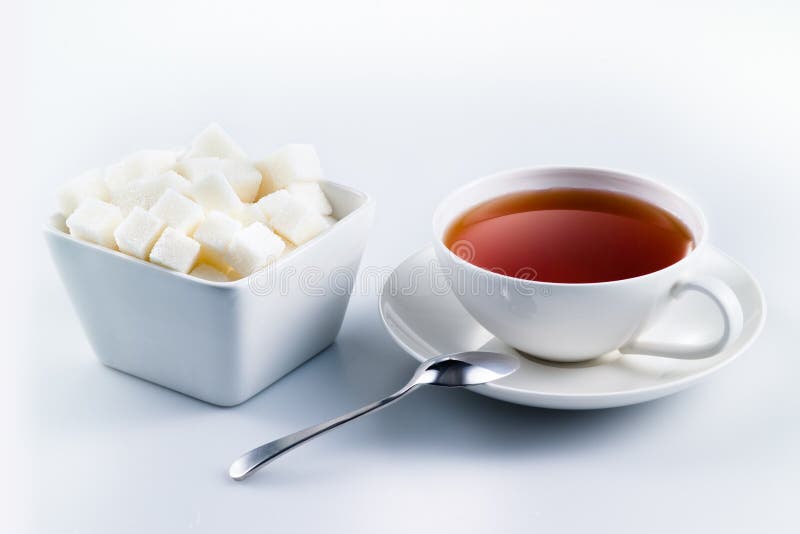Black tea with sugar cubes stock photo. Image of isolated 36564496