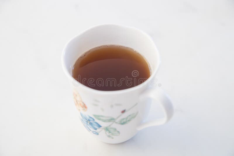 Black tea in tea cup stock photo. Image of afternoon 169999290