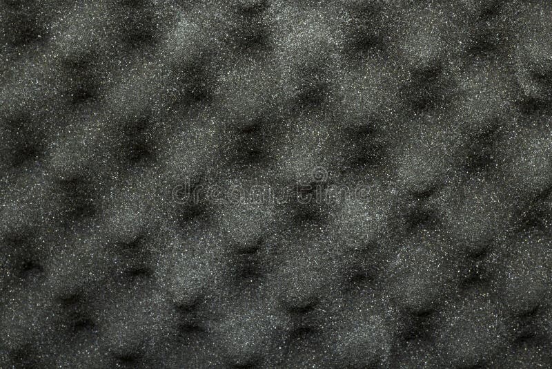 Black texture background with glitter. synthetic. foam. unusual