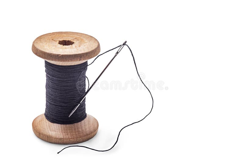 Wooden spool of black thread Stock Photo by ©avtor_hell 60248557
