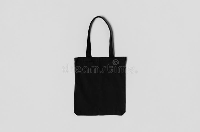 Download Black Tote Bag Mockup On A Grey Background Stock Photo ...