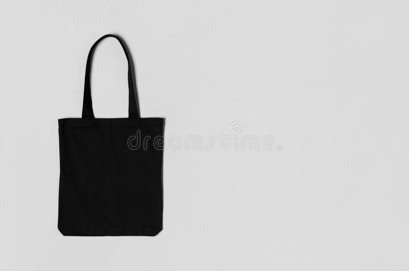 Black Tote Bag Mockup on a Grey Background with Copyspace Stock Image -  Image of organic, grey: 173029959