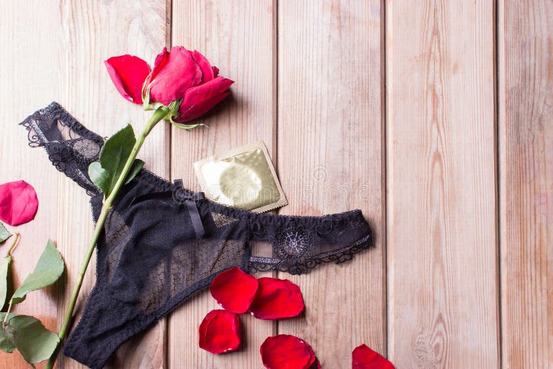 Black underwear and roses stock image. Image of bridal 100445783