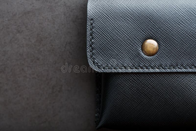 Black Wallet Made of Genuine Leather on a Dark Background. Handmade ...