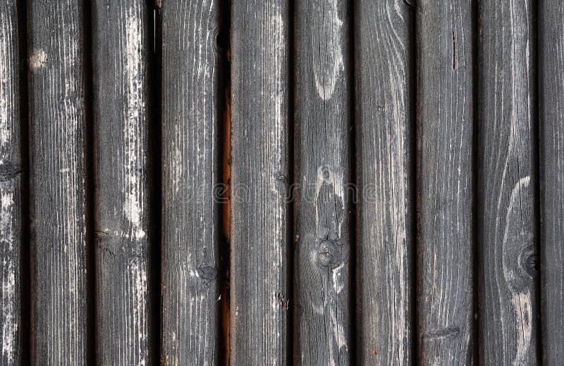 Black painted weathered wooden fence texture stock photos