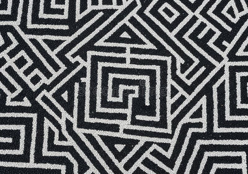 Black and white abstract geometric pattern features interlocking rectangular and triangular shapes. stock illustration