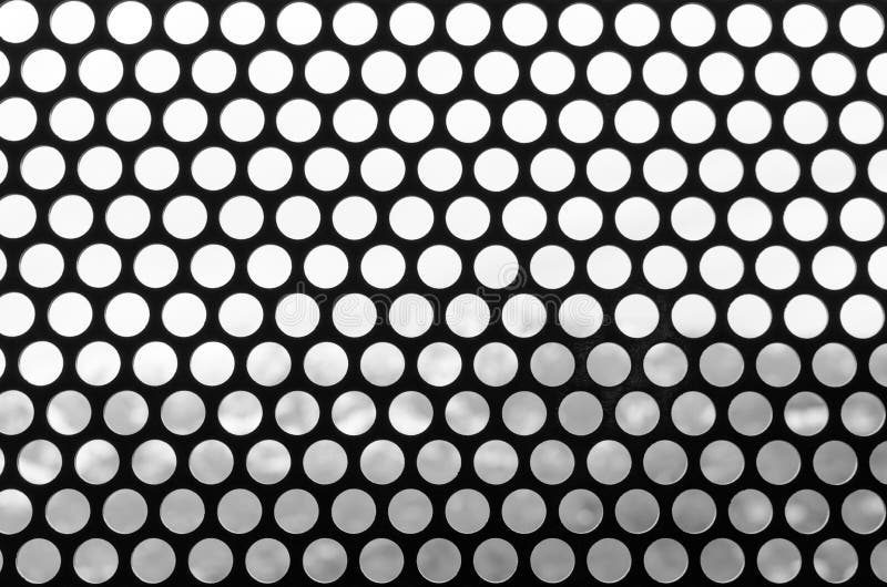 Black and white background of a grid of spotted. Pattern of round holes vintage style. Photo for web site slider. vector illustration
