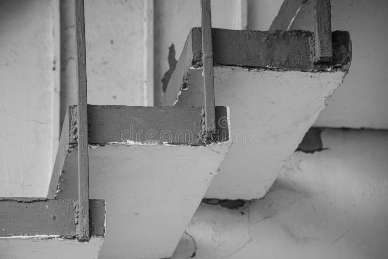 Monochrome background of stone stairs and metal construction stock image Monochrome background of stone stairs and metal construction stock image