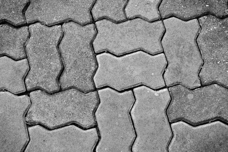 Black and white brick walk path in public park royalty free stock photos