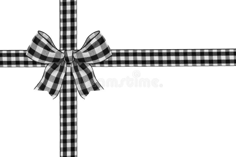 Black and white buffalo plaid Christmas gift bow and ribbon arranged as wrapped gift box isolated on white