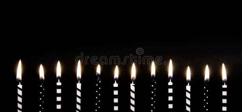 Black & White Burning Candles stock image