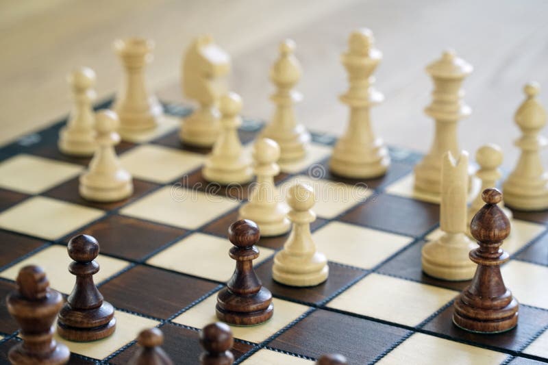 Browse Free HD Images of Chess Pieces In Focus On A Wooden Chess Board