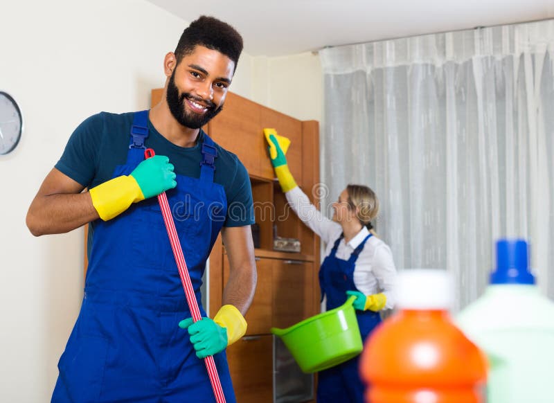 Black and White Cleaners at the Work Stock Image Image of