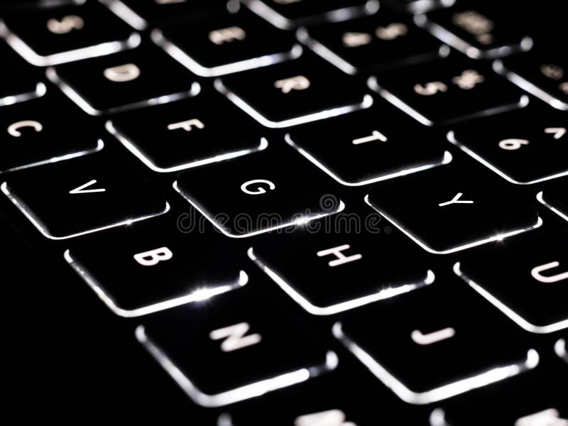 Black and white close-up on illuminated keys of computer keyboard stock images Black and white close-up on illuminated keys of computer keyboard stock images