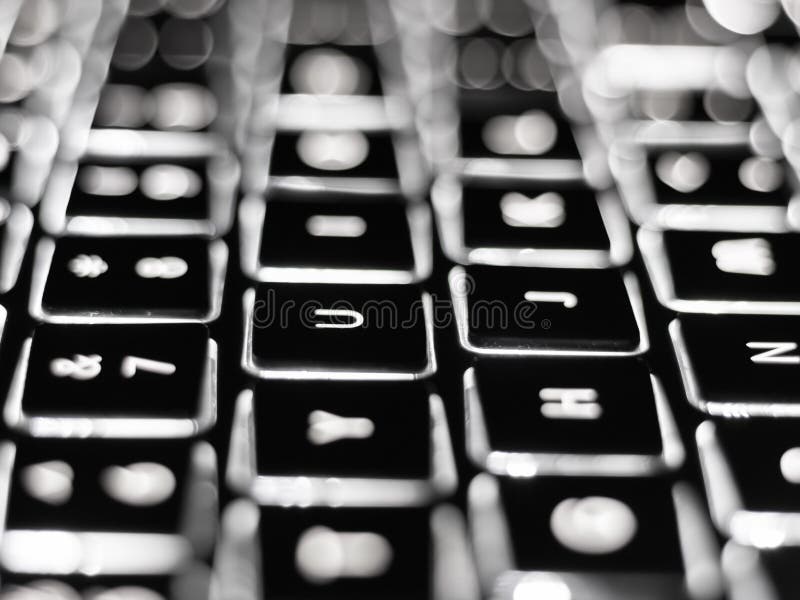 Black and white close-up on illuminated keys of computer keyboard royalty free stock photography Black and white close-up on illuminated keys of computer keyboard royalty free stock photography