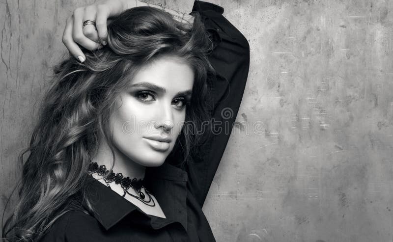 Black and White Closeup Portrait of Young Beautiful Woman in Black Shirt  Posing in Front of a Metal Wall Stock Photo - Image of elegant, cute:  107809134