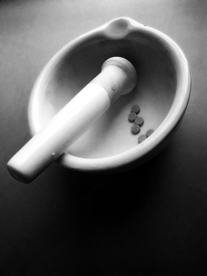 Mortir stamper and money stock image. Image of mortir 109755571