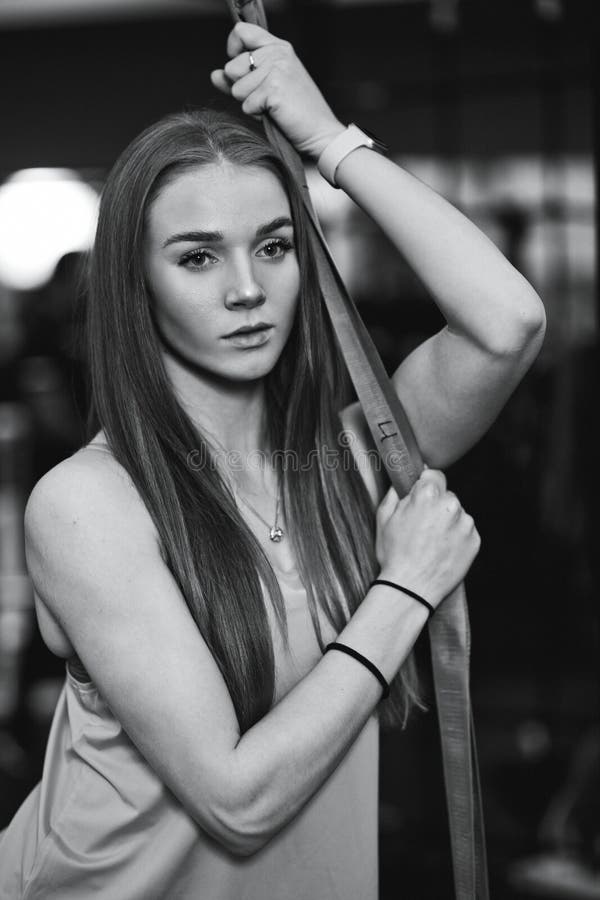 Black And White Photo Of The Beautiful Athletic Girl Dressed In Sporty