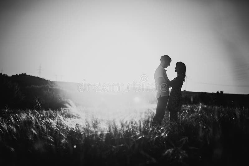 Black White Photography Romantic Couple Standing And Kissing On