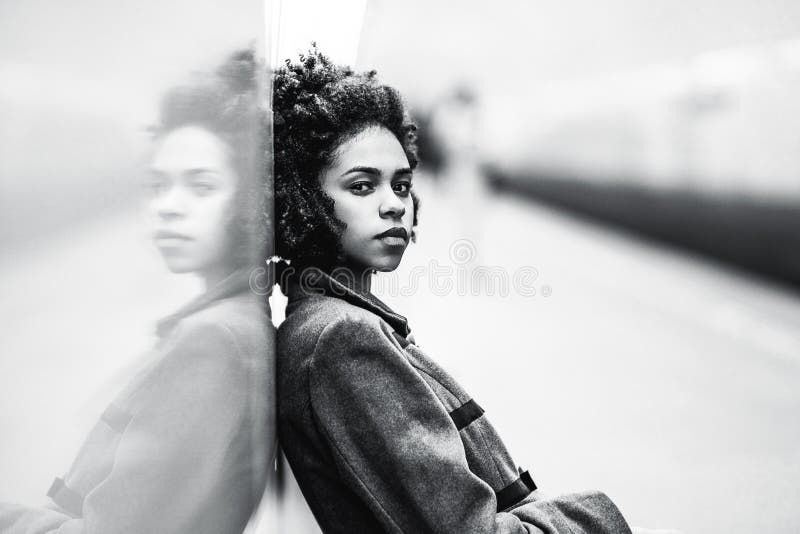 Greyscale portrait of black girl at the metro station royalty free stock images Greyscale portrait of black girl at the metro station royalty free stock images