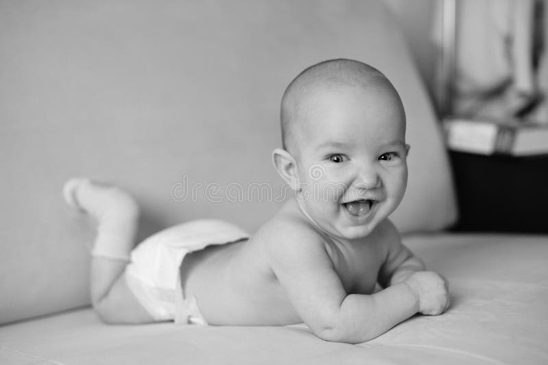 Black And White Portrait Of Little Smiling Newborn Baby Cute Happy