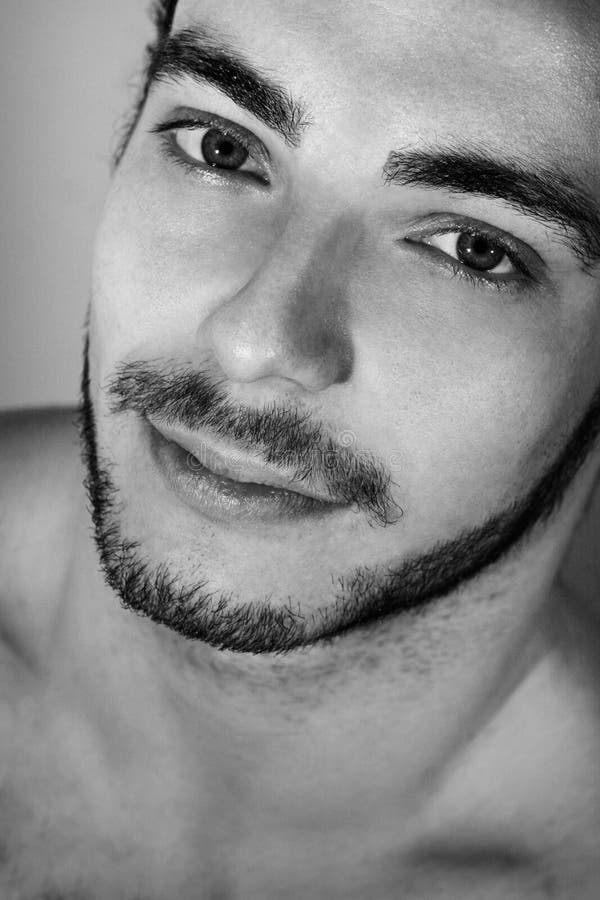 Black and white portrait of young and sensual italian man with beard stock images Black and white portrait of young and sensual italian man with beard stock images