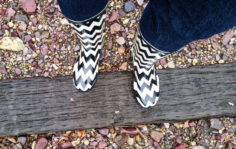 black and white rain boots