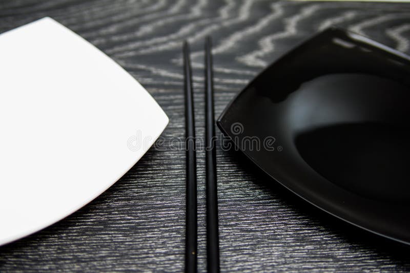 Black and White Square Plate with Chopsticks Stock Image Image of