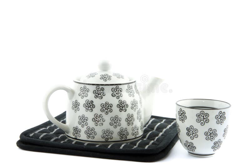 Black and white teapot and teacup