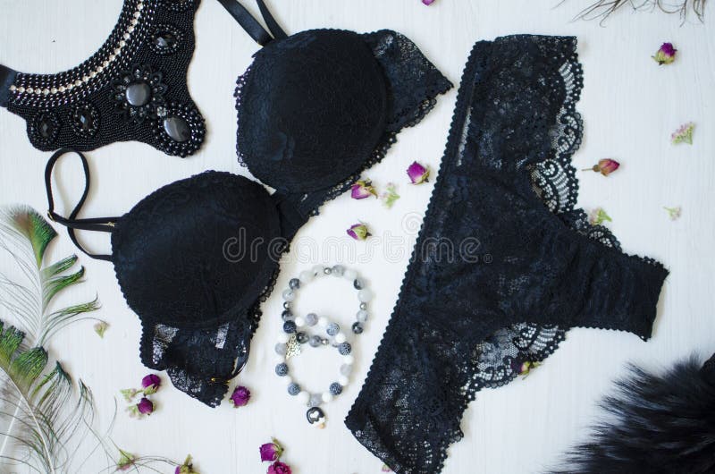 Fashion lace underwear. Women white and black sexy bra and panties.  Expensive underwear set Stock Photo