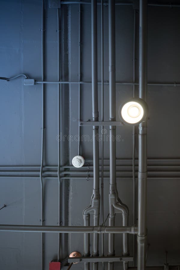 Black wire and pipeline. stock image. Image of repair 66657171