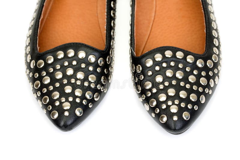 Black women s leather ballet flats with steel rivets close up