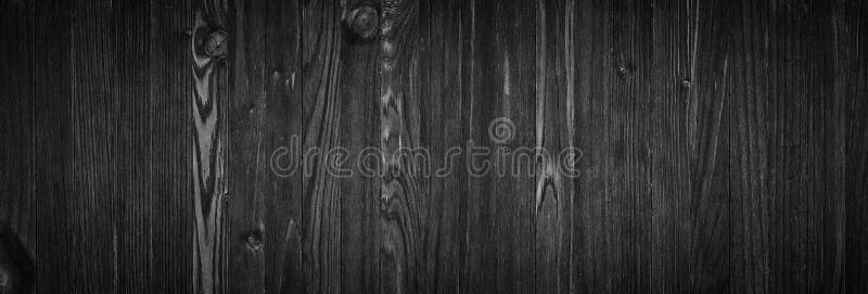 Black wood surface texture as a background, wide panorama stock photo