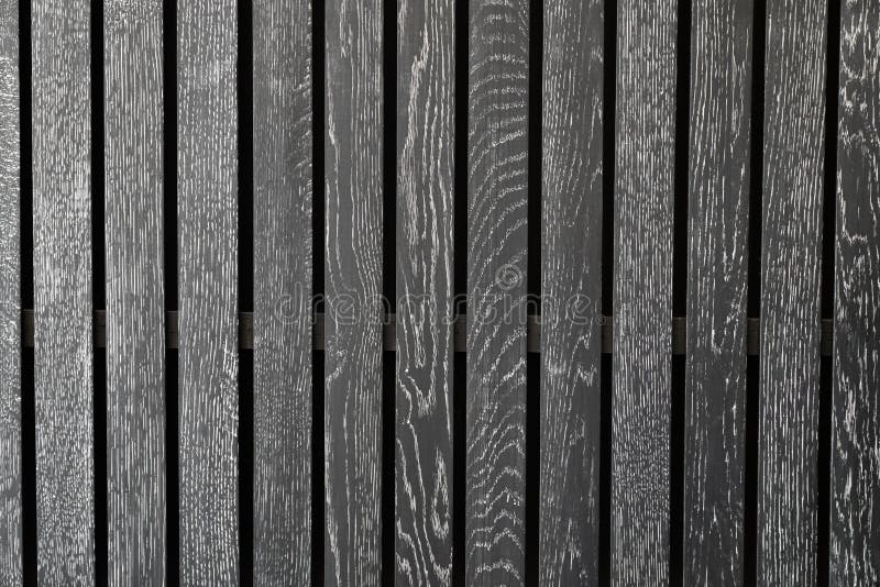 Black wooden battens with white  scraping burrs. background texture interior design stock image