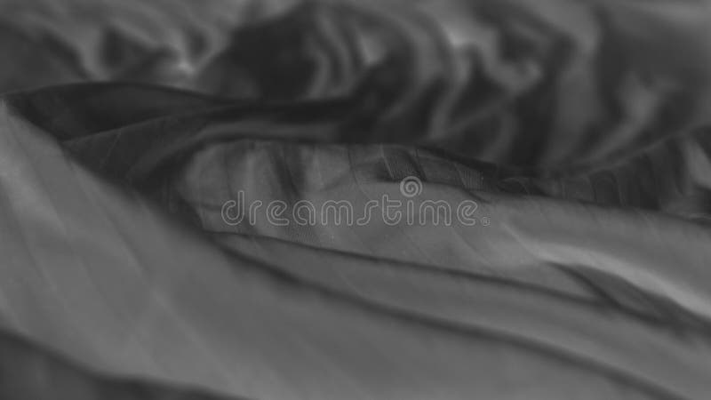 Black wrinkled fabric with visible details royalty free stock image