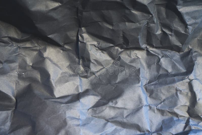 Black wrinkled paper texture royalty free stock photography