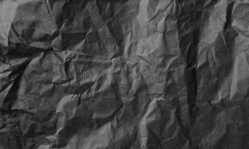 Black wrinkled paper royalty free stock photo