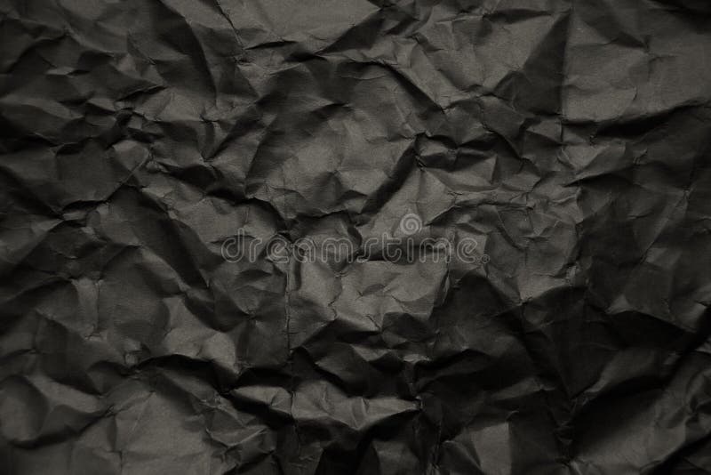Black wrinkled paper texture. royalty free stock images