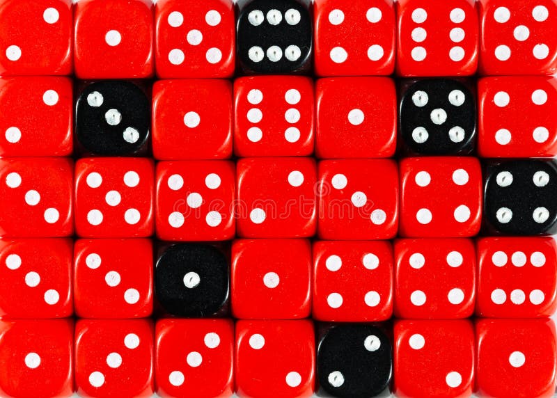 BlackBackground of random ordered red dices with six black cubes stock images
